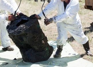 Image showing the decommissioning of waste, helping to ensure this is done safely and correctly incase the waste is in fact contaminated.