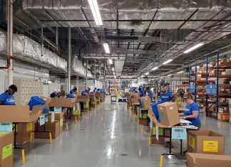 Madico staff assemble and package Safe-Gard Face Shields