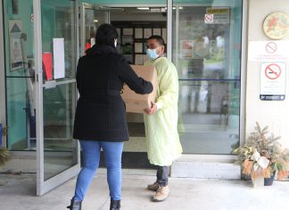 Keter employee delivers donated face shields to a long-term care facility.