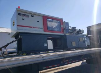 Ferromatik Milacron injection molding machine used to produce the PPE masks.