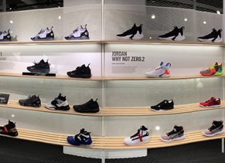 Nike sneakers on display in a sporting goods retail store in Chicago, IL.