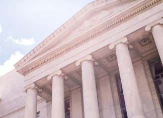 The nature of government contracts provides stability in that many are multi-year with options. (Unsplash free stock photo by Katie Moum)