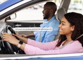 Driver uses in-vehicle, hands-free voice assistant to roll down the windows and increase radio volume.SoundHound, Inc.