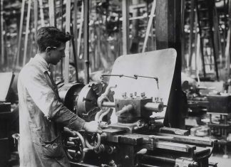 Factory floors are different now. But attracting the youth generation is just as important today. (1918 factory floor of D. Napier & Son Ltd for manufacturing engines)