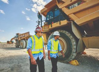 Workers working in high-risk areas with proper equipment