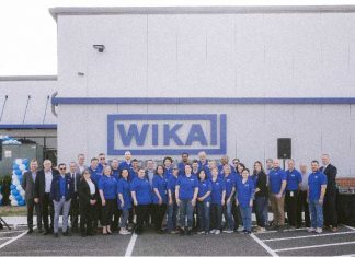 wika grand opening employees group facility photo