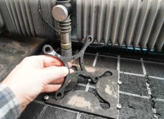 Carbon fiber drone parts produced in-house using an affordable desktop waterjet cutter.